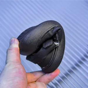 Close-up showing the high flexibility and foldable rubber sole of the black mesh beach shoe