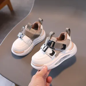 Kids fashion sneakers with color-block panels and double buckle straps in a stylish design