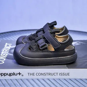 Kids black closed-toe mesh sandals with adjustable double hook-and-loop straps