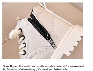 Detail view of cream leather kids boots with smooth black side zipper and thick serrated sole