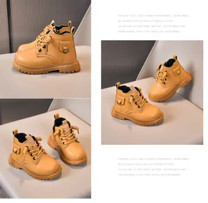 Detail view of yellow leather kids boots featuring side pocket and anti-slip thick soles