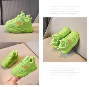 Detail view of neon green kids sneakers with breathable mesh and velcro closure