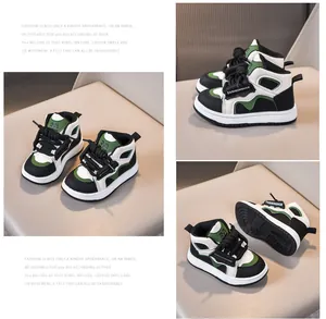 Λεπτομερής προβολή των παιδικών high-top sneakers σε μαύρο, λευκό και πράσινο δέρμα