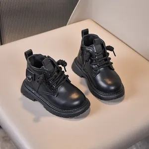 Detail view of black matte leather kids boots featuring side zipper and thick non-slip sole