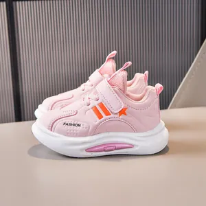 Pink kids sneakers with fashion star pattern and velcro closure on anti-slip sole