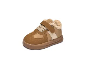 Close-up of children's winter shoes with warm plush lining and velcro straps