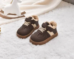 Close-up of winter toddler boots with thick fleece lining and velcro closure strap