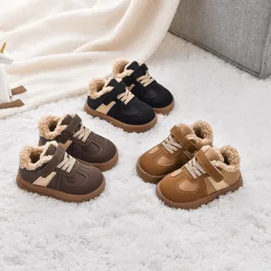 Winter fleece-lined kids sneakers in black and brown with warm faux shearling lining