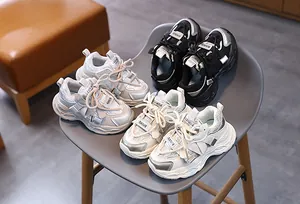 Detailed macro view showing three color options for breathable mesh kids sneakers