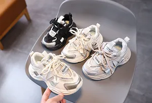 Mesh detail of kids sneakers with velcro straps and thick anti-slip rubber soles