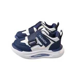 Sneakers per bambini in pelle blu navy con doppio velcro e suola in gomma spessa