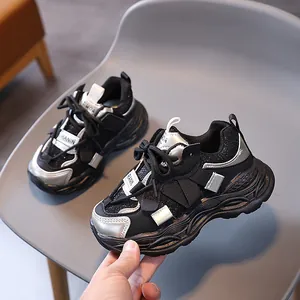 Breathable mesh kids sneakers in black and silver with reflective chunky sole design