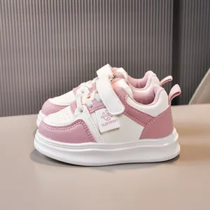 Pink and white breathable mesh children sneaker with velcro strap and thick sole