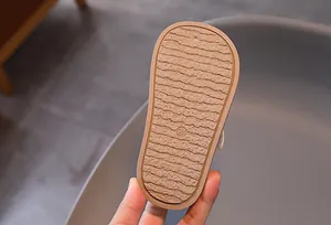 Macro detail of khaki soft rubber wavy anti-slip sole with size 24 marking