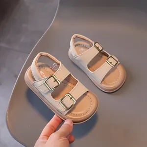 Kids open-toe beach sandals in beige with dual straps and retro metal buckles