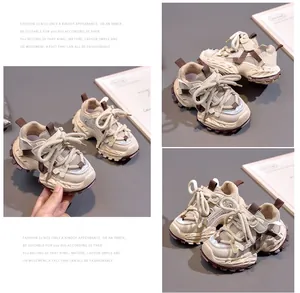 Detail view of children's thick-soled chunky sneakers with breathable mesh and beige finish