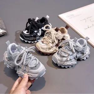 Close-up of kids dad shoes featuring breathable mesh panels and thick anti-slip soles
