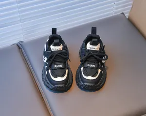 Detail of breathable mesh upper and durable Velcro strap on kids athletic dad shoes