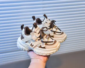 Detail of breathable mesh kids' chunky sneakers with non-slip thick rubber soles
