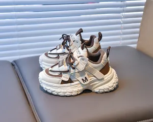 Detail view of children's mesh sneakers with thick non-slip soles and velcro closure