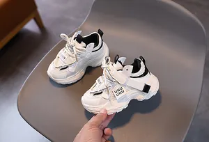 Close-up of kids' breathable mesh sneakers with non-slip thick sole and velcro closure