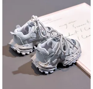 Close-up of children's grey dad shoes with breathable mesh and thick anti-slip sole