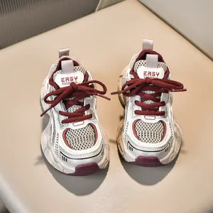 Top view of girl's chunky sneakers featuring breathable mesh and retro silver white panels