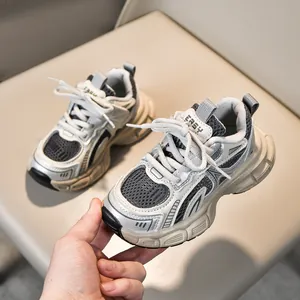 Detail view of breathable mesh and synthetic leather frame on children chunky sneakers