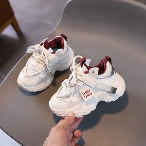 Breathable white mesh kids sneakers with burgundy accents and non-slip thick rubber soles
