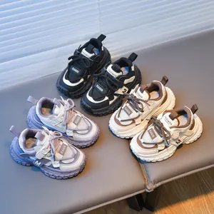 Breathable mesh kids sneakers with thick soft soles in black, beige, and purple