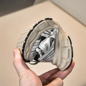 Detail showing the ultra-flexible rubber sole and breathable mesh of these kids' sneakers