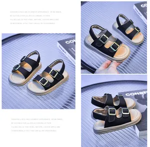 Close-up of black kids' sandals featuring golden buckles and thickened anti-slip soles