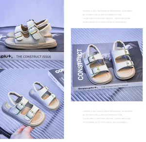 Detail view of cream toddler sandals with adjustable double buckles and soft non-slip soles