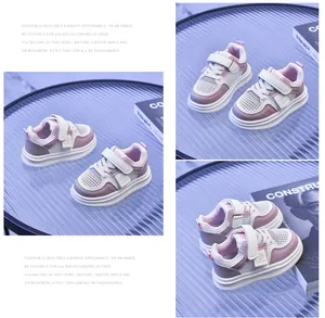 Detail of pink and purple mesh breathable kids sneakers with velcro straps and thick soles