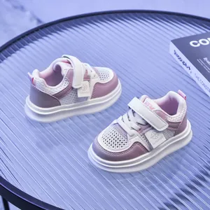 Close-up of pink breathable mesh sneakers for kids with durable velcro closure
