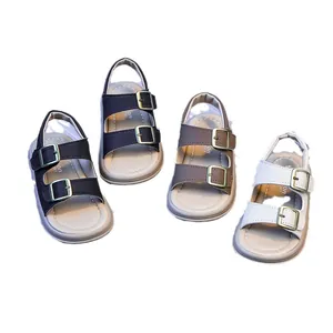Children's buckle sandals in black, blue, brown, and white with soft soles