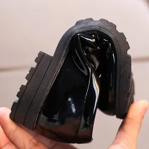 Classic black patent leather kids shoes with flexible soft sole and slip-resistant grip