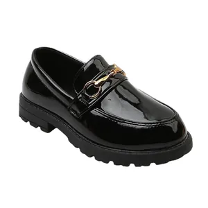 Classic black patent leather loafers for children with gold metal horsebit and chunky sole