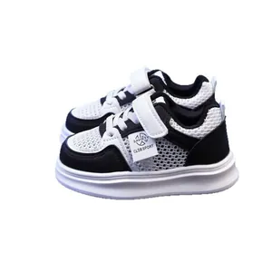 Kids breathable mesh sneakers in black and white with hook-and-loop closure for summer