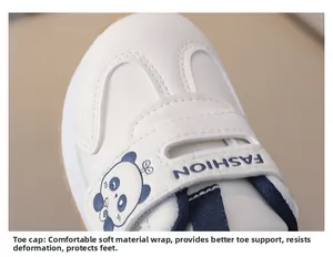 Close-up of baby sneakers showing the panda pattern and fashion strap details