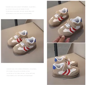 Detail of kids casual sneaker with red wave patterns and velcro closure system