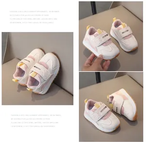 Detail of toddler fleece-lined sneakers with dual velcro straps and cartoon decor