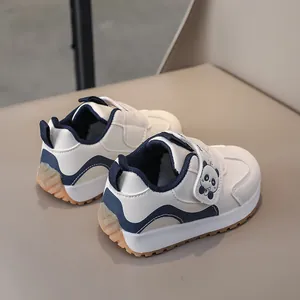 Detailed back view of toddler sneakers with panda velcro strap and rubber sole