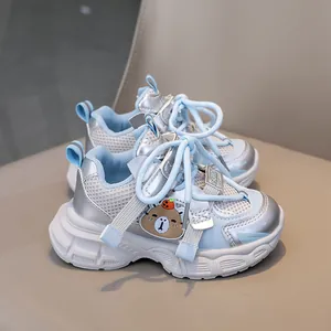 Close-up of kids mesh running shoes with cute cartoon bear and fashion lettering