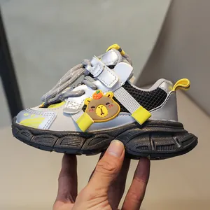 Detail of kids breathable mesh sneaker with cute 3D bear and non-slip rubber sole