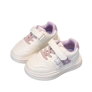 Kids white faux leather sneakers with purple accents and cute bear pattern decor
