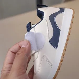 Detail of the easy hook-and-loop closure on these fleece-lined toddler athletic sneakers