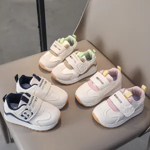 Kids casual sneakers with cute cartoon panda and rabbit motifs and velcro straps