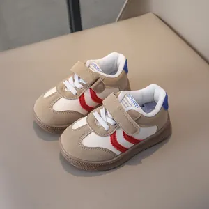 Kids breathable leather sneakers with red stripes and non-slip rubber soles
