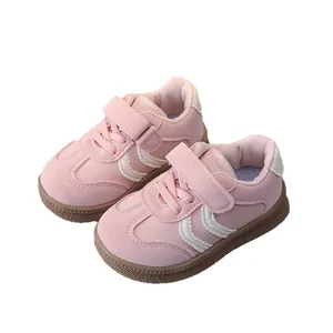 Pink breathable kids sneakers with magic tape closure and soft rubber sole for boys and girls